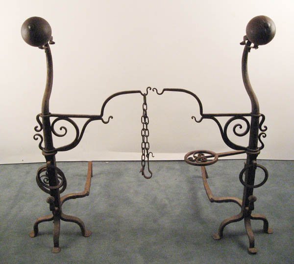A Pair of Monumental Andirons,