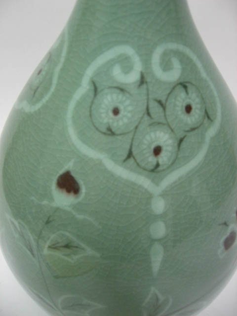 An Asian Celadon Bottle Vase, - 2