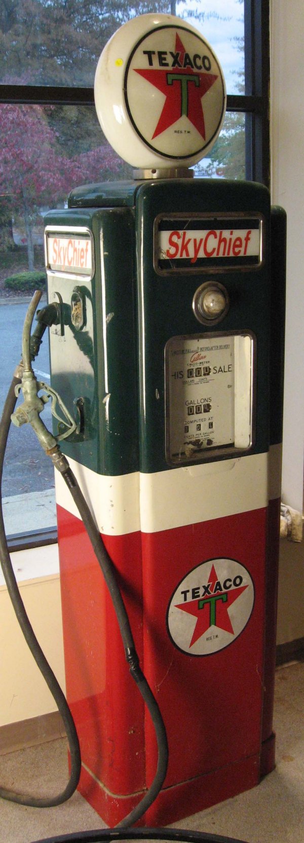 Texaco Gas Pump w/ Gilbarco Calco-meter: some damage (the last price was 30 7/10 cents per gallon!). 76 H, 24" W, 18" D."