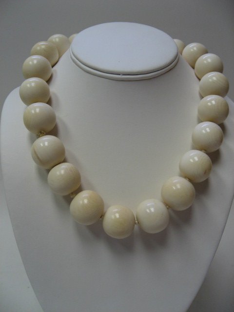 A Large Ivory Bead Necklace,