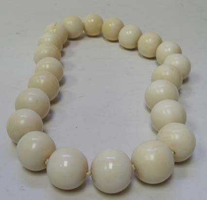 A Large Ivory Bead Necklace, - 2