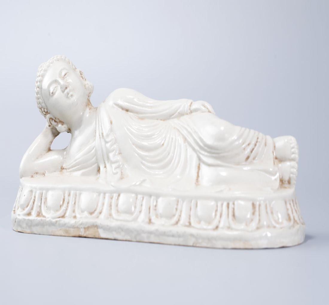 DING KILN WHITE GLAZED LYING BUDDHA STATUTE (1 of 10)