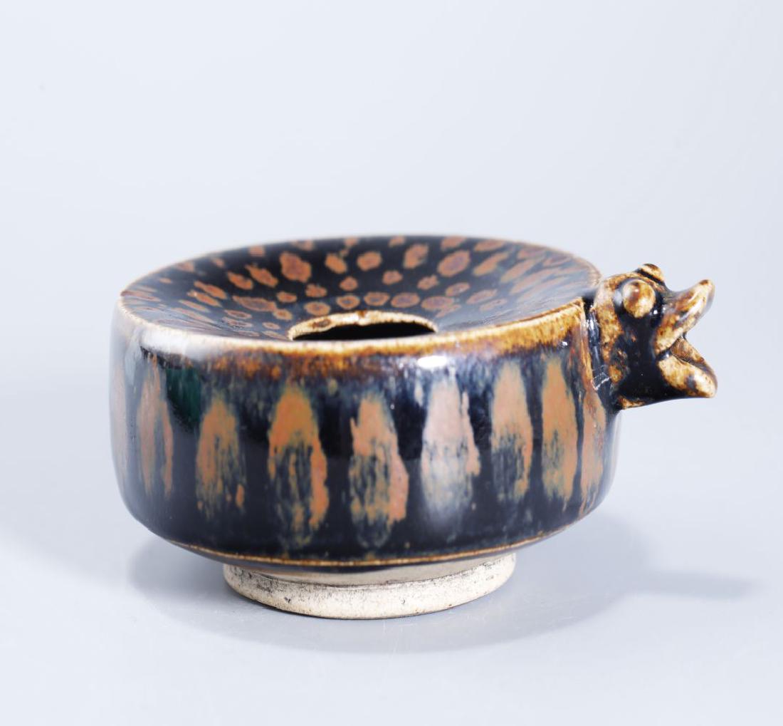 BLACK GLAZED RUSTY INKSTONE: Black glazed rusty inkstone: Height: 3.5cm, Length: 10cm