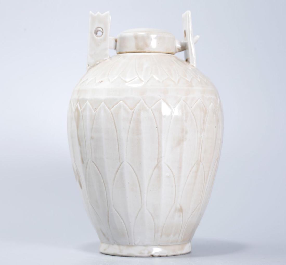 DING KILN WHITE GLAZED JAR WITH LOTUS PETAL PATTERN (1 of 10)