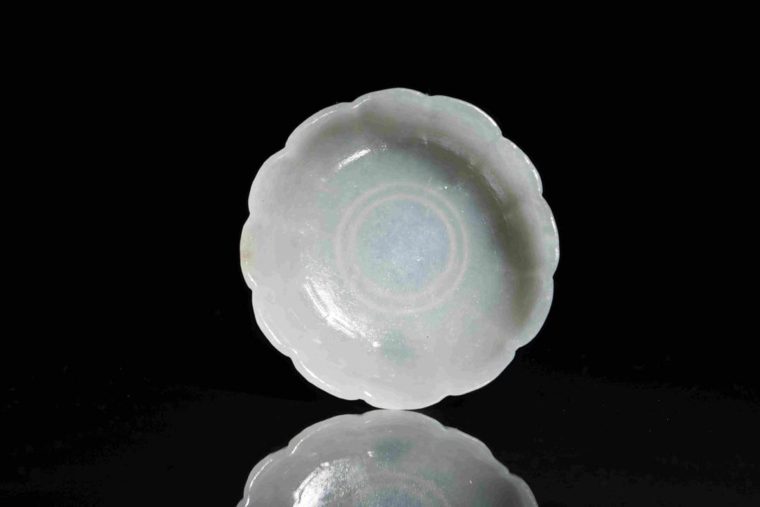 WHITE JADE SAUCER IN LOTUS PETAL SHAPE: White jade saucer in lotus petal shape: Height: 1.7cm, Diameter: 5.3cm, Weight: 31g