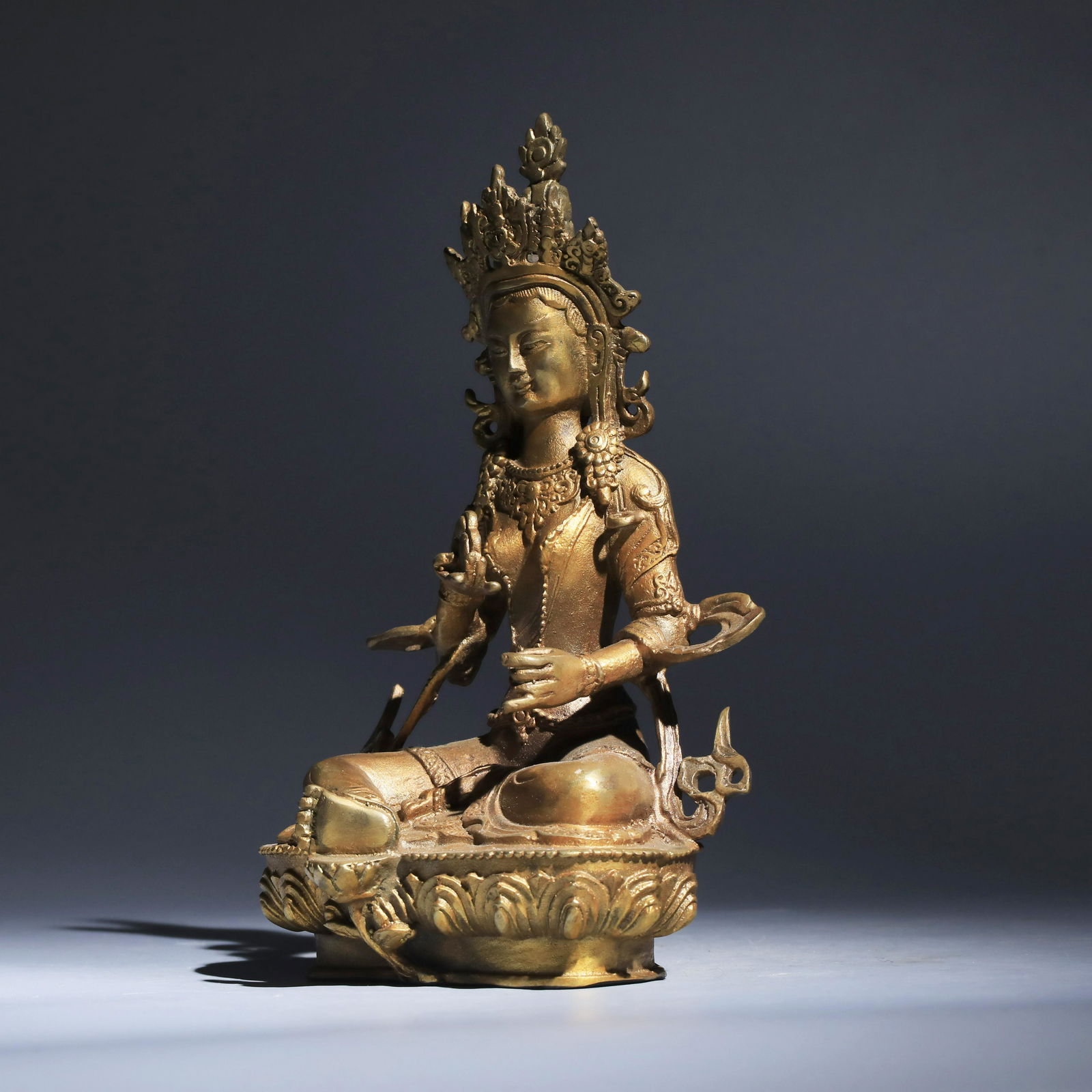 A gold-plated bronze ware Buddha Statue of Fortune (1 of 7)