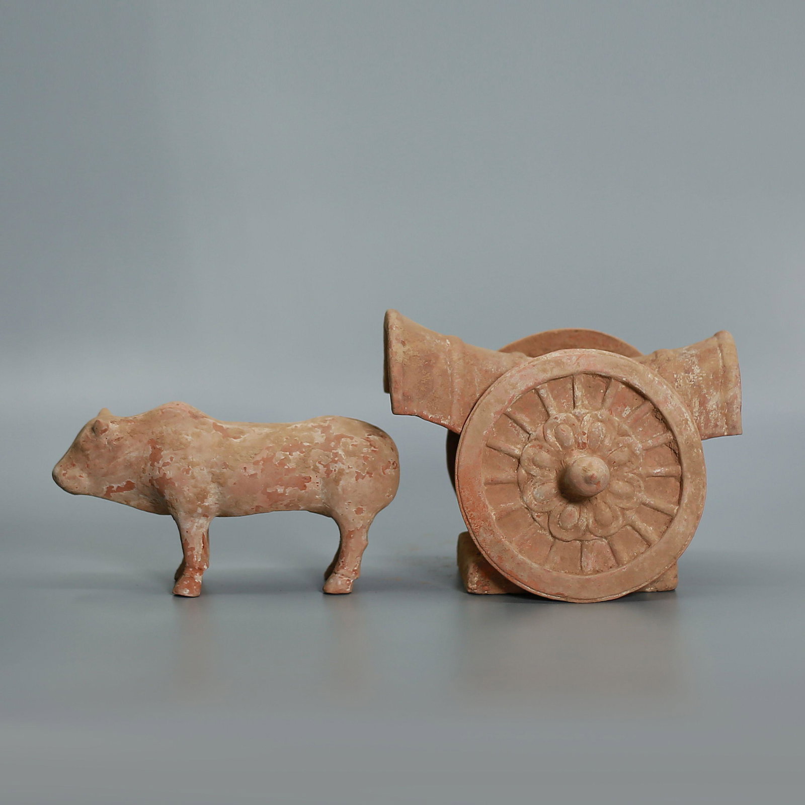A Pottery Buffalo: Lï¼š22.5cmï¼ŒWideï¼š7.7cm,Hï¼š12.3cmï¼Lï¼š22.4cmï¼ŒWideï¼š10.6cmï¼ŒHï¼š17.9cmï¼Diamï¼š16.1cm