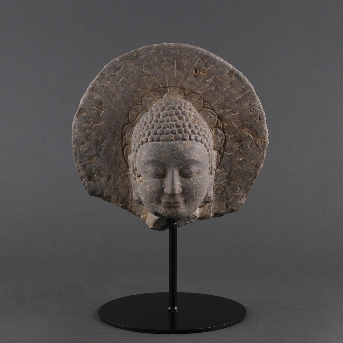 A LIMESTONE HEAD OF BUDDHA NORTHERN QI DYNASTY (1 of 9)