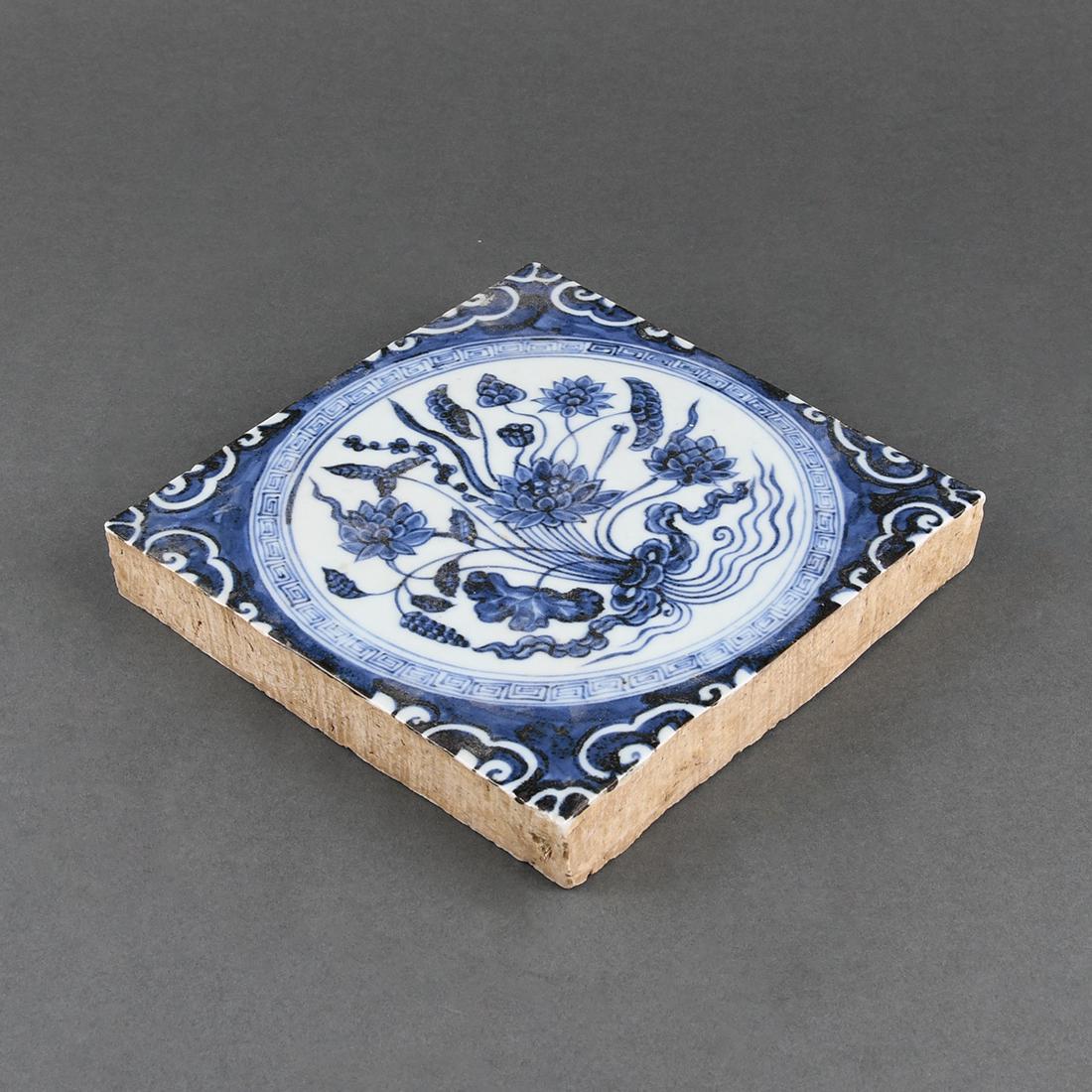 A BLUE AND WHITE 'LOTUS' SQUARE TILE (1 of 5)
