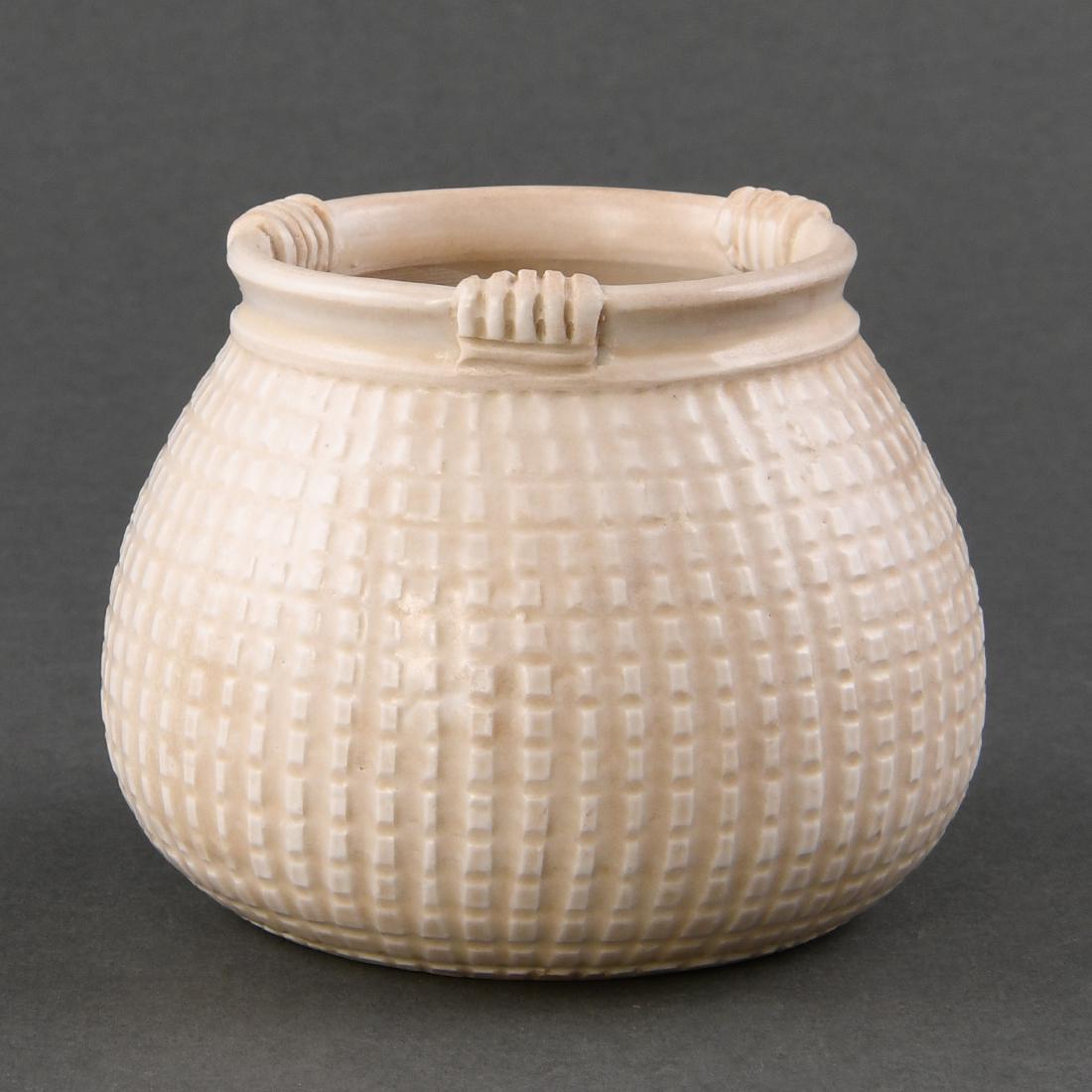 A SMALL 'DING' JAR WITH BASKET PATTERN (1 of 8)