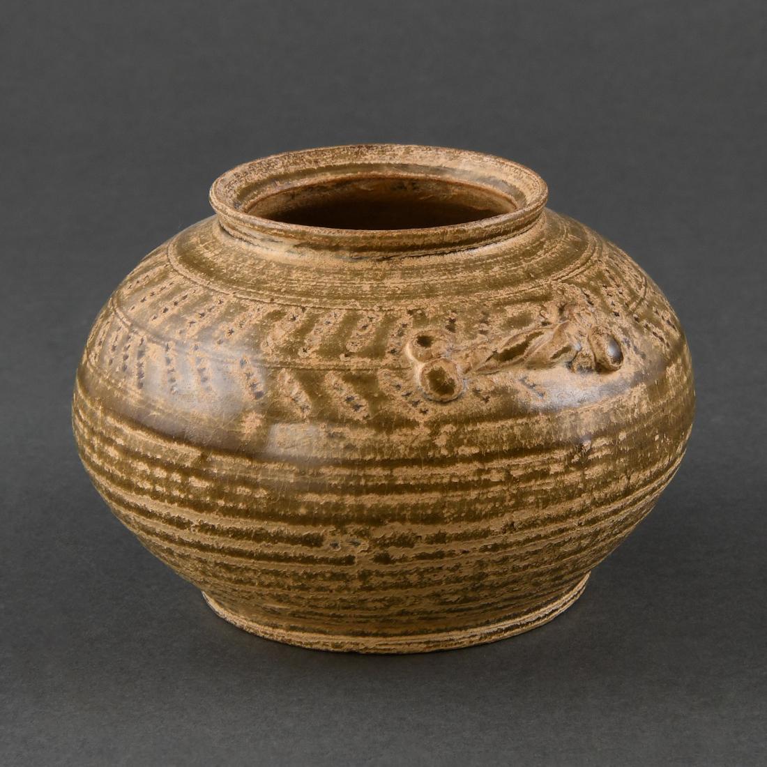 A 'YUE' CELADON 'HERRING-BONE-MOTIFS' JAR: A 'YUE' CELADON 'HERRING-BONE-MOTIFS' JAR Size: H:8.2cm,W:12.3cm,Diam.of mouth:6.5