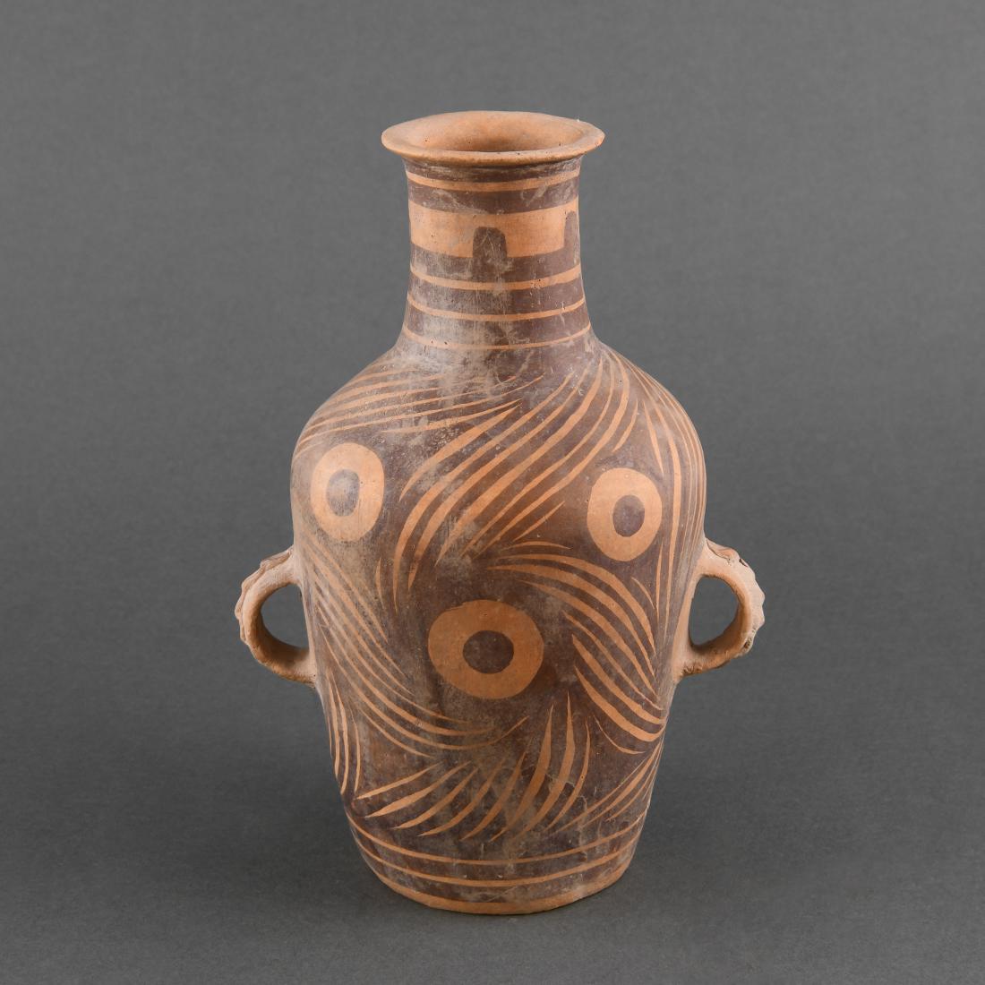 A MAJIAYAO PAINTED POTTERY HANDLED VASE (1 of 10)