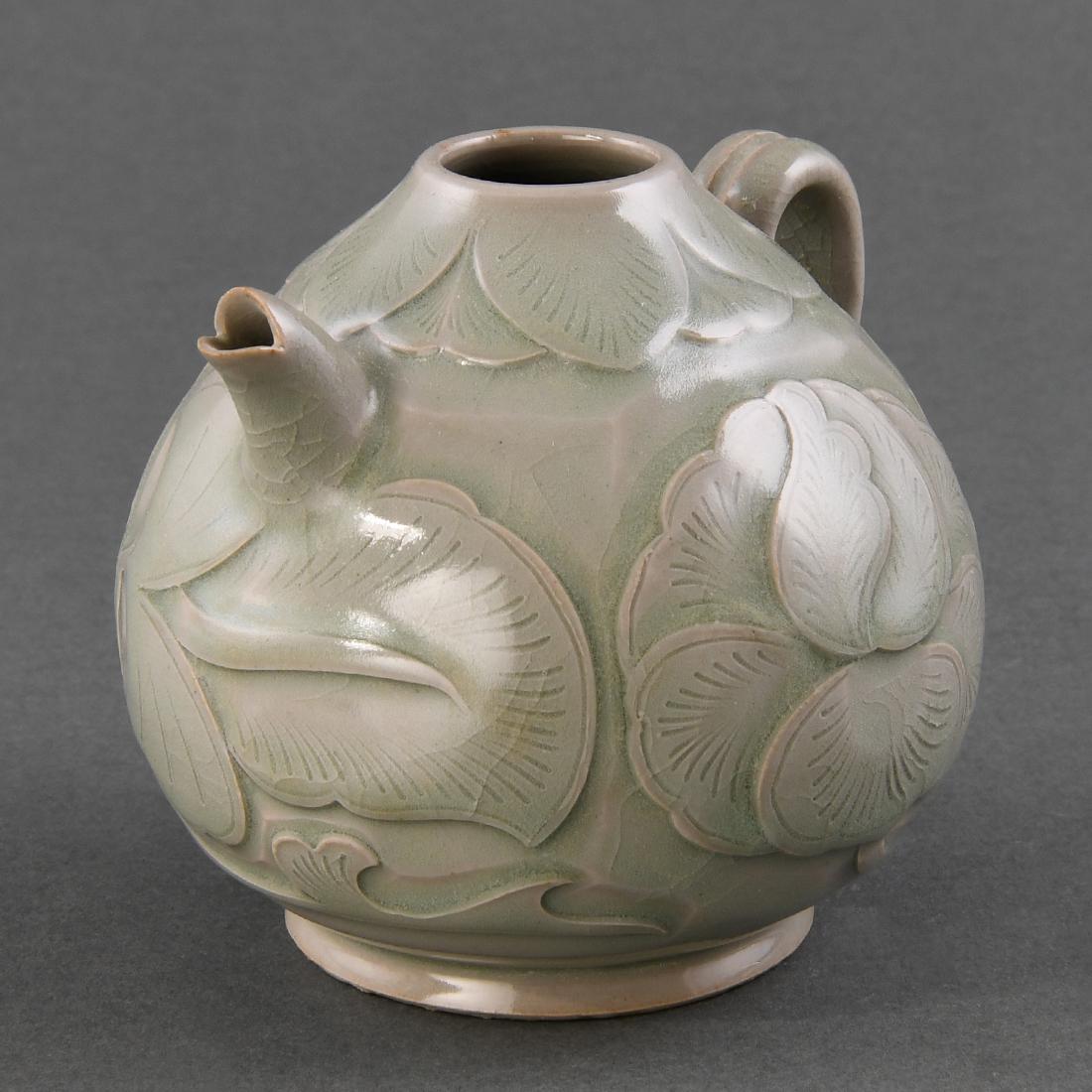 A FINE CARVED 'YAOZHOU' 'PEONY' TEAPOT (1 of 8)