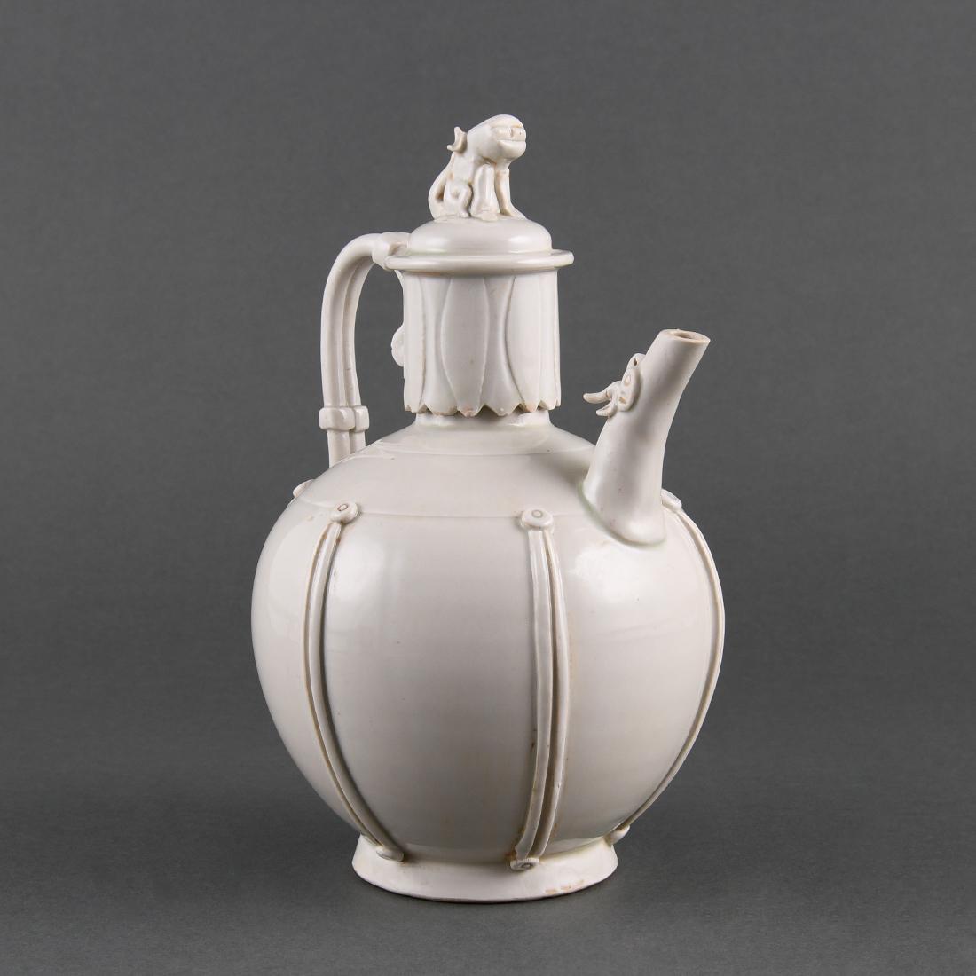 A RARE WHITE-GLAZED 'DING' EWER AND COVER (1 of 9)