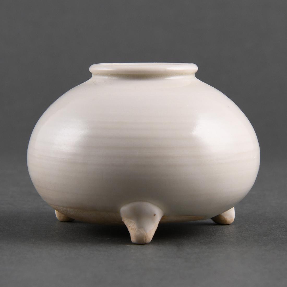 A WHITE-GLAZED 'XING' TRIPOD WATERPOT (1 of 8)