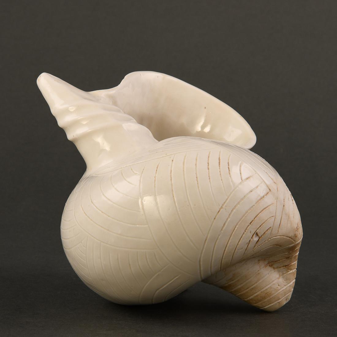A 'DING' WHITE-GLAZED MODEL OF A CONICAL SHELL (1 of 9)