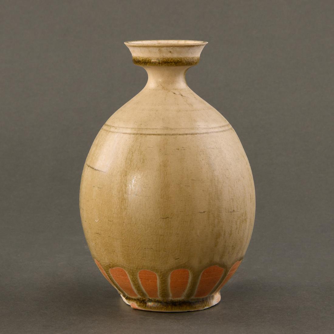 A RARE CELADON-GLAZED RIBBED VASE, HU (1 of 8)