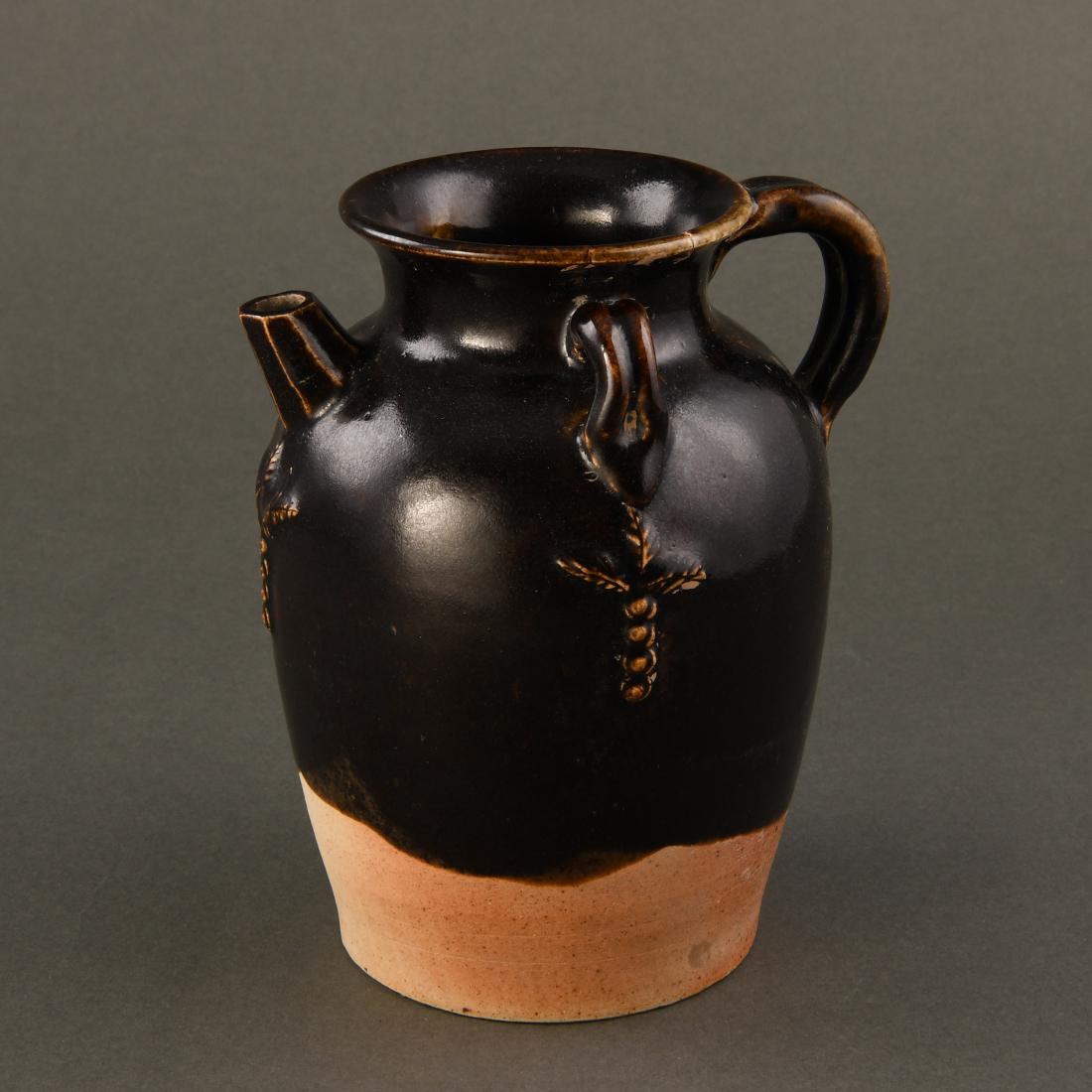 A RARE BLACK 'YAOZHOU' HANDLED EWER (1 of 9)