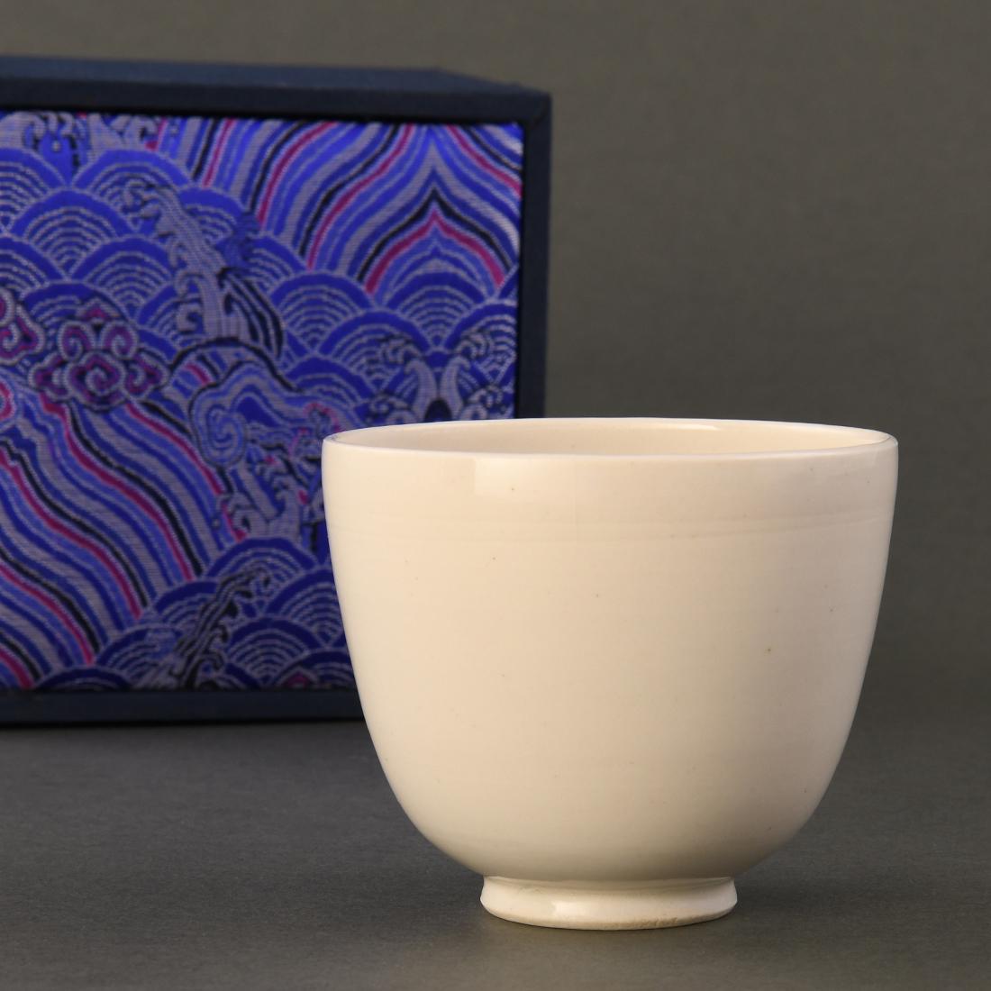 A RARE 'XING' WHITE-GLAZED  CUP (1 of 9)