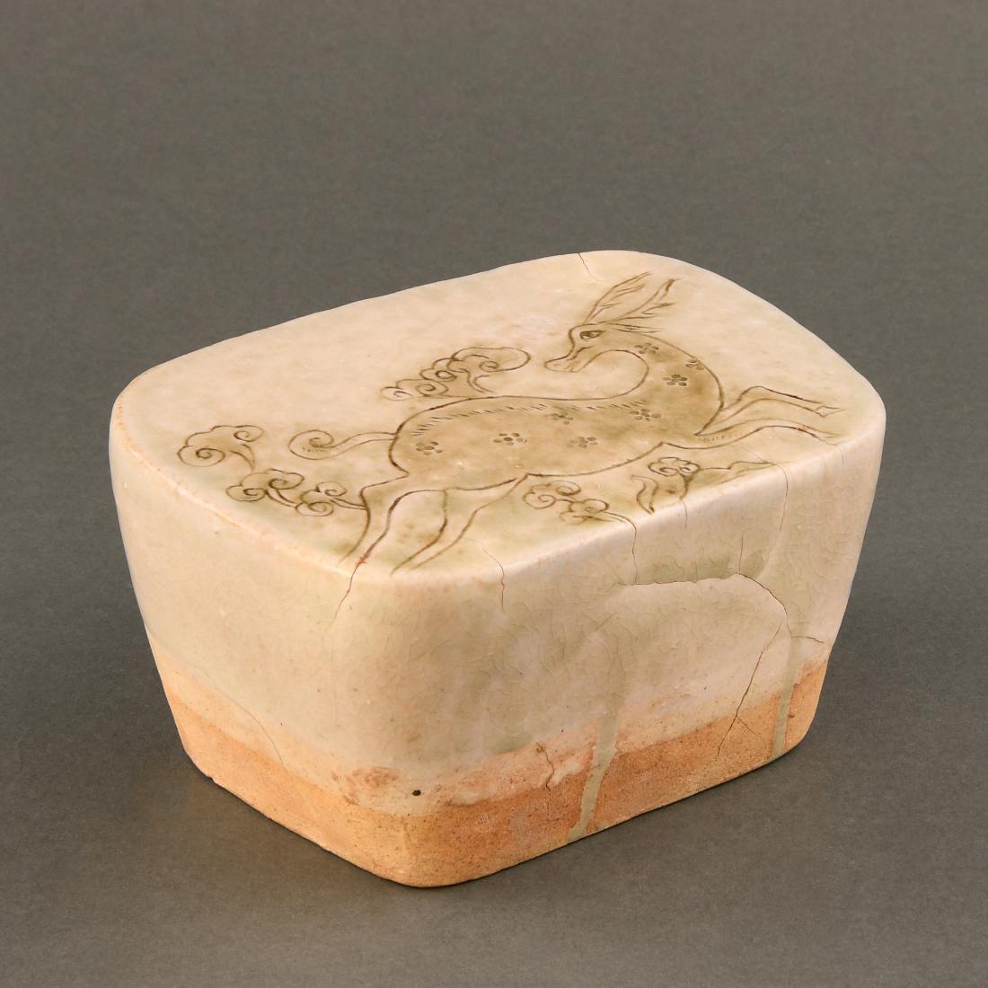 AN UNUSUAL PALE-CELADON-GLAZED 'DEER' PILLOW (1 of 7)