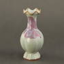 A 'JUN' PURPLE-SPLASHED FOLIATE-RIM VASE