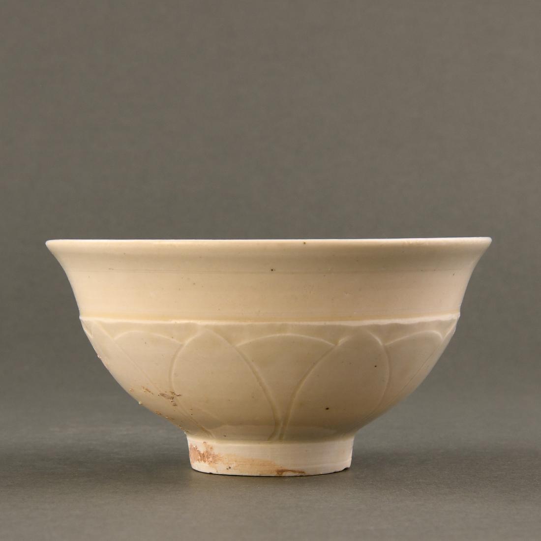 A 'DING' WHITE GLAZE 'LOTUS AND PEONY' BOWL (1 of 8)