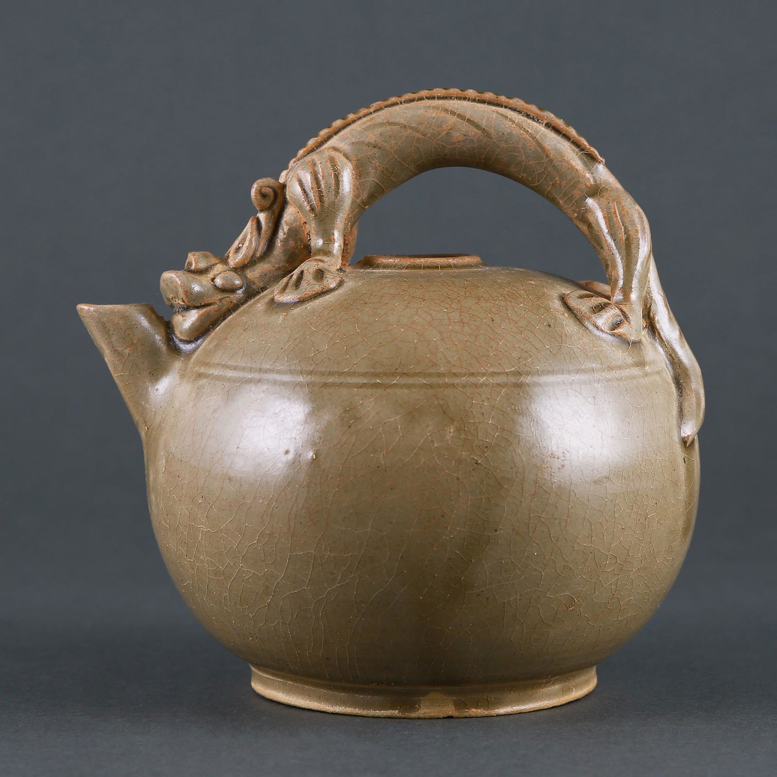 A 'YUE' CELADON DRAGON-HANDLED LOOP EWER (1 of 7)