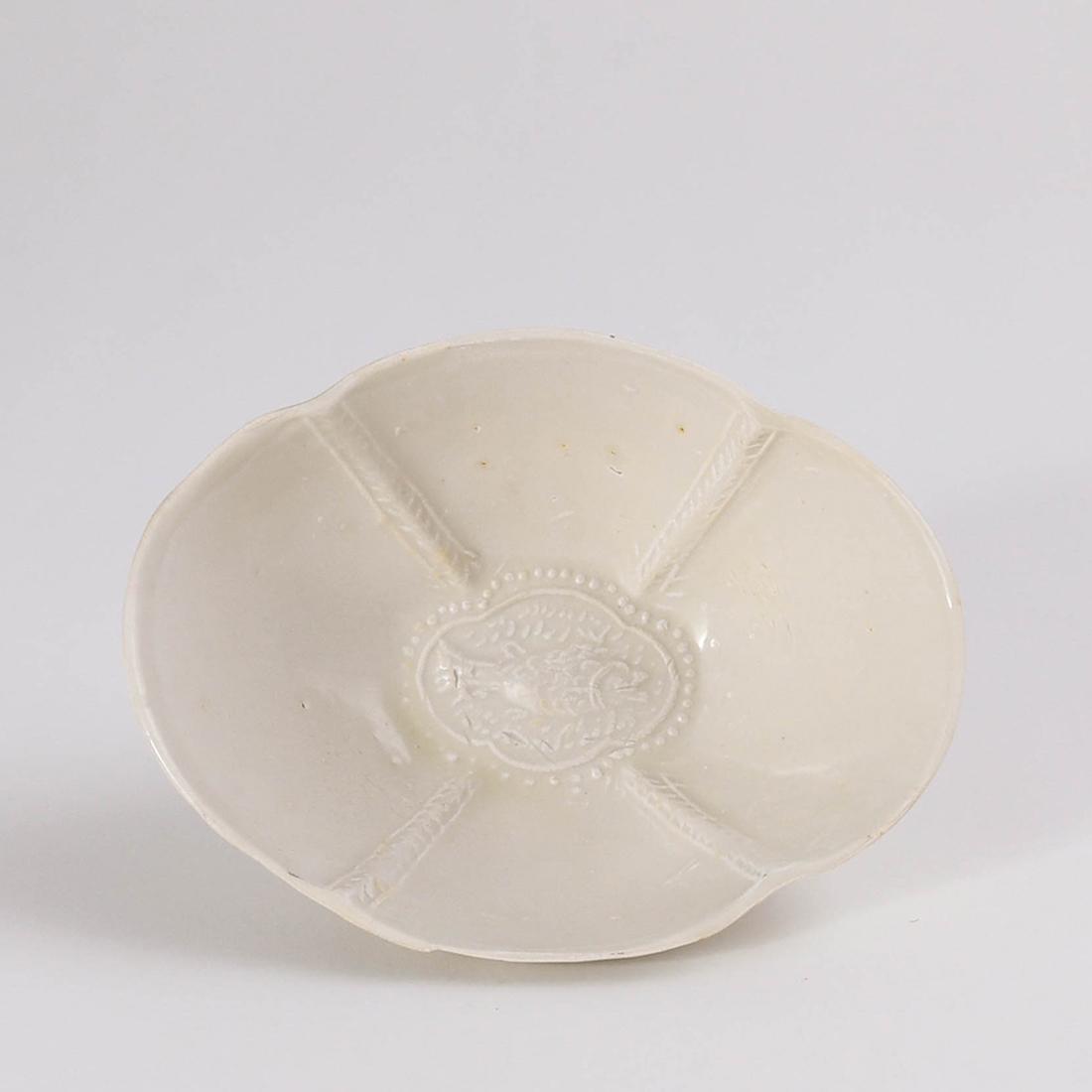 A 'DING' WHITE 'FISH' QUATREFOIL CUP (1 of 9)