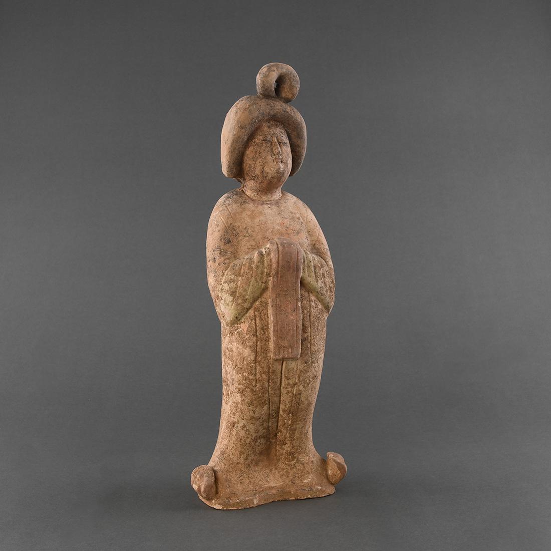 A PAINTED POTTERY FIGURE OF A 'FAT LADY' (1 of 8)