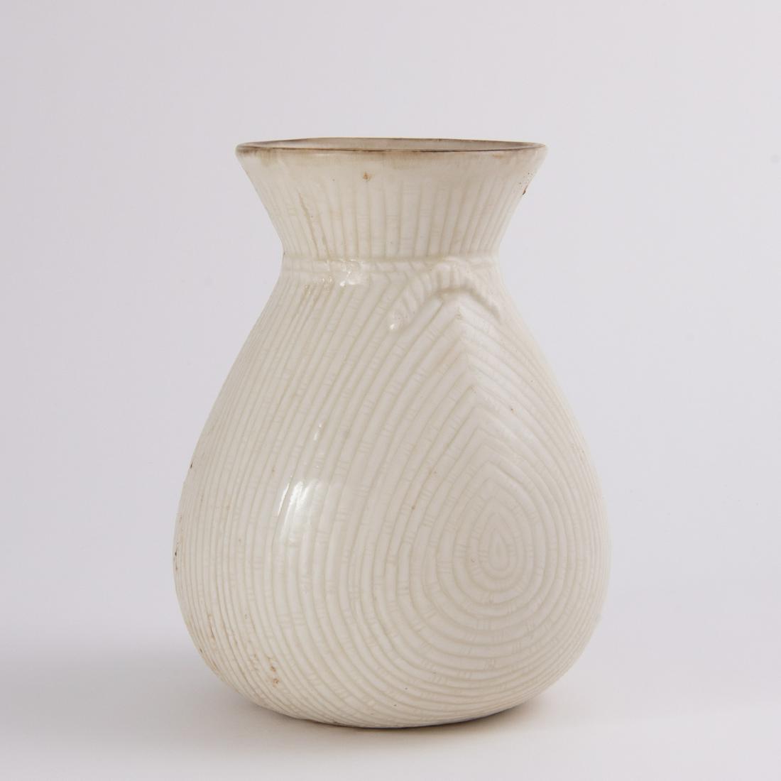A 'DING' WHITE-GLAZED 'BASKET-WEAVE' JAR (1 of 6)