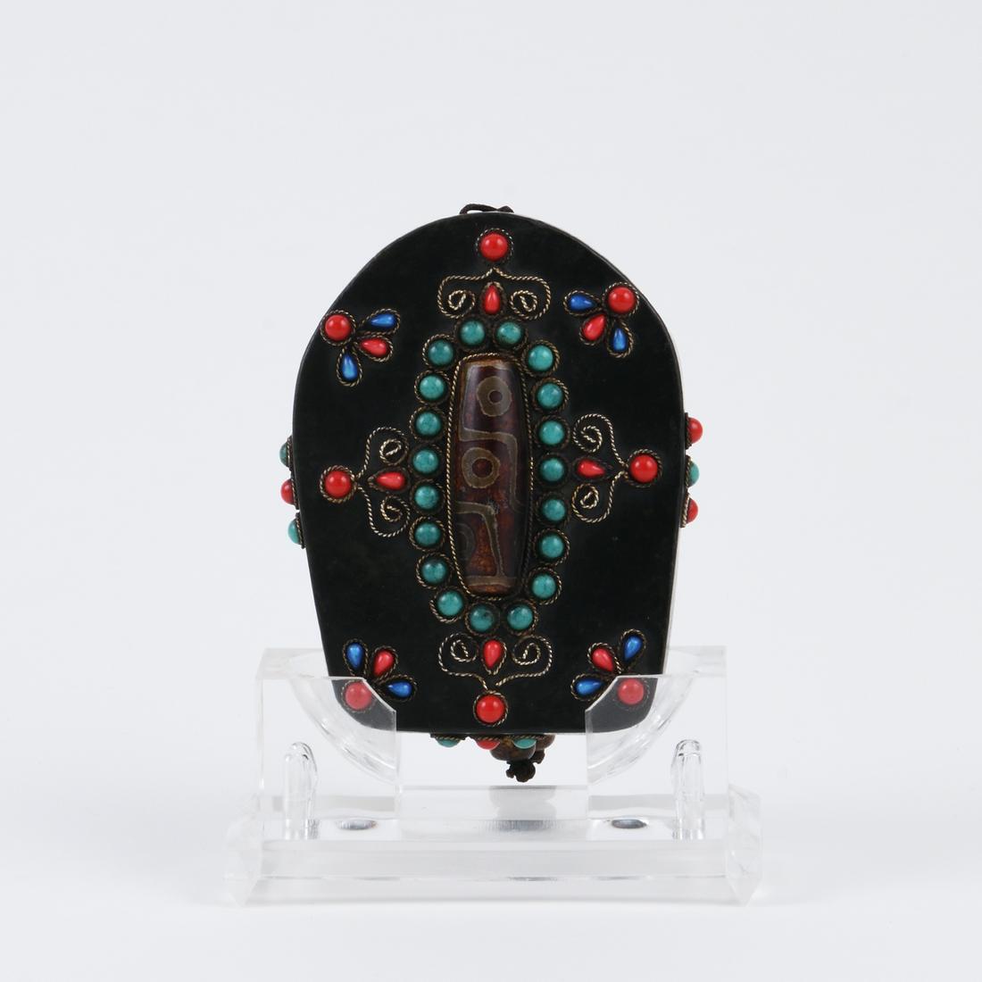 A TIBETAN 'DZI' BEAD METEORITE ORNAMENT (1 of 6)