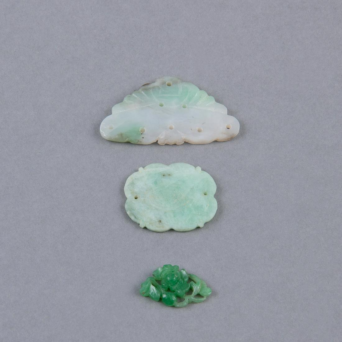 A GROUP OF THREE JADEITE PENDANTS (1 of 4)