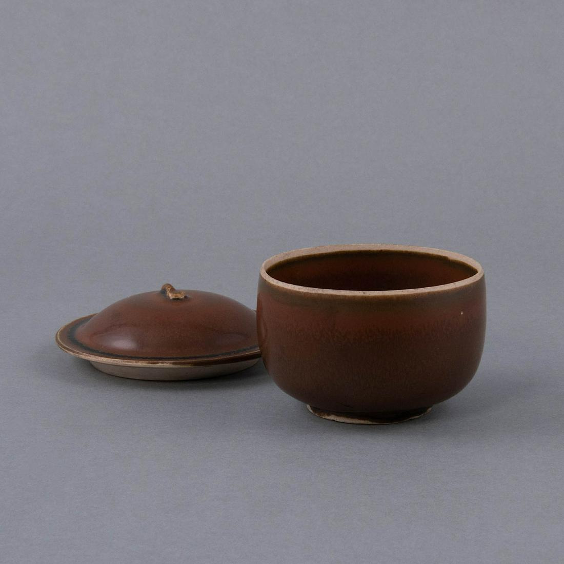 A RARE 'DING' PERSIMMON-GLAZED BOWL AND COVER (1 of 6)