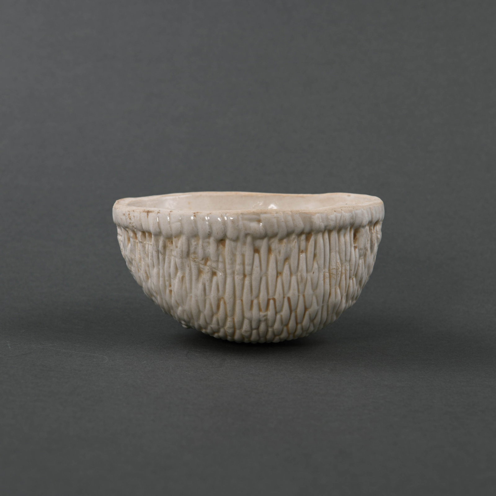 A RARE WHITE 'DING' SIMULATED BASKET-WEAVE CARVED BOWL (1 of 7)