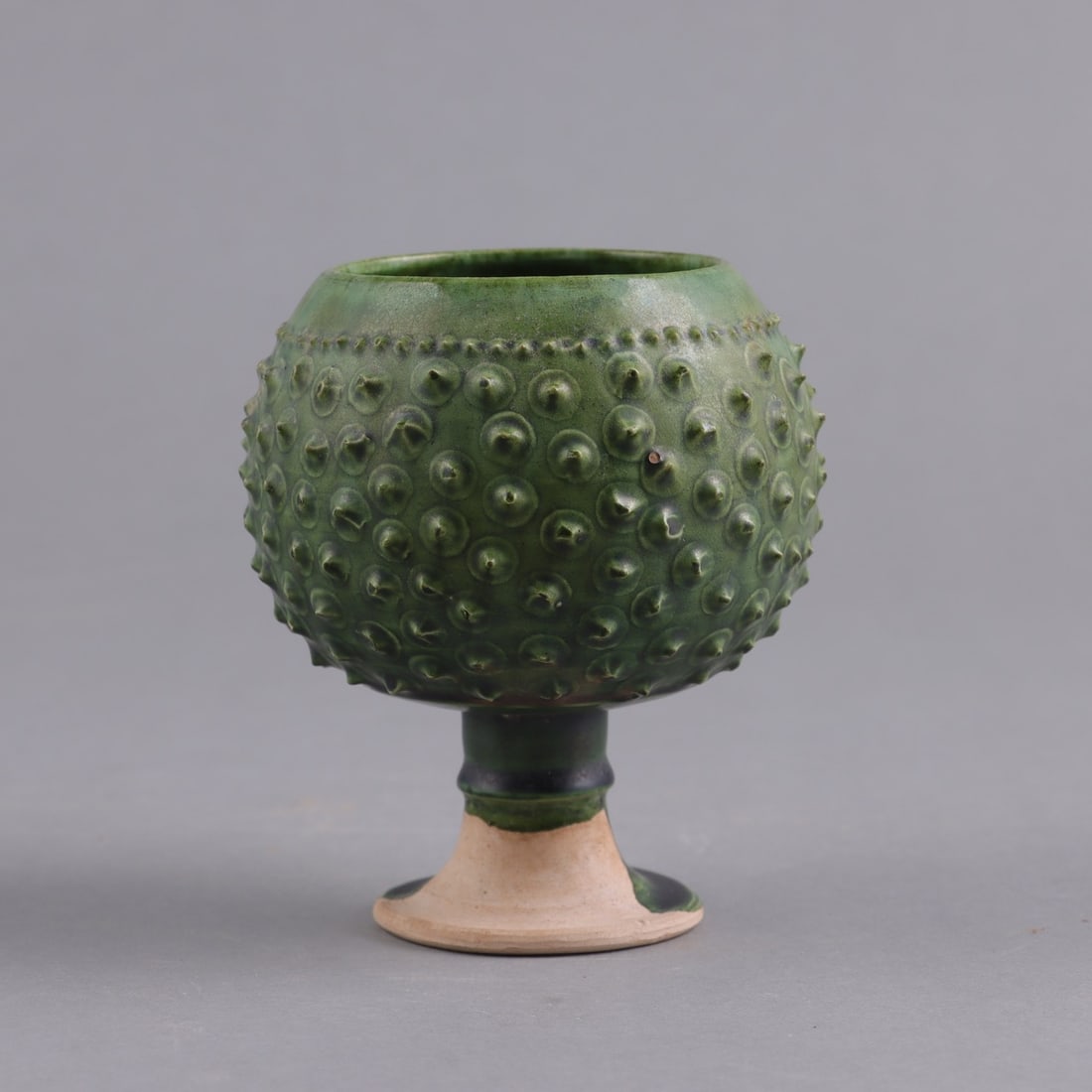 A MOLDED 'GONGXIAN'  GREEN-GLAZED STEM CUP (1 of 9)