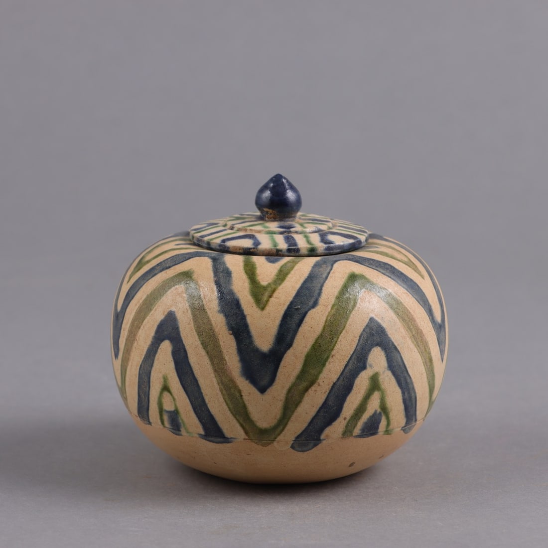 A 'SANCAI' JAR AND COVER (1 of 8)