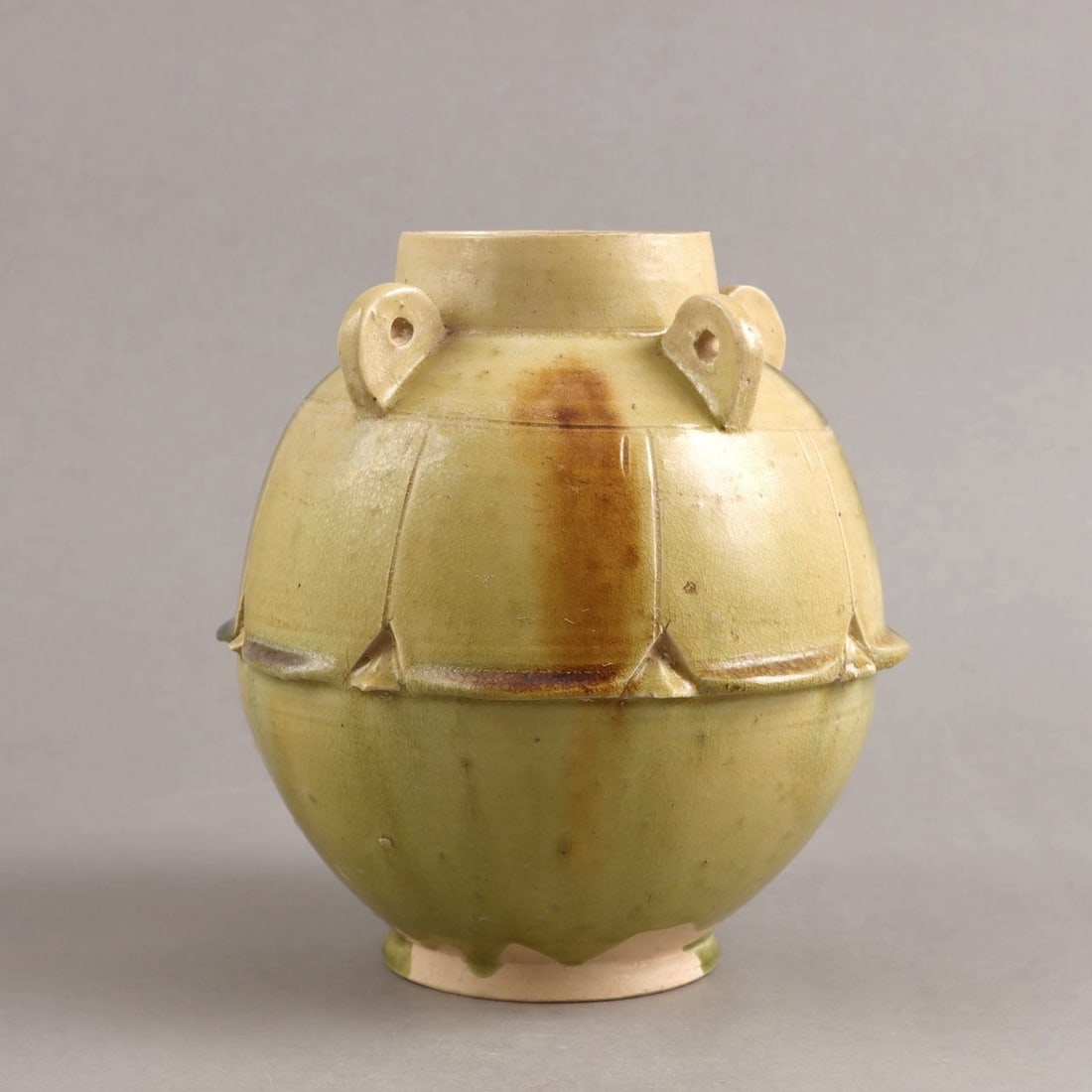 A TANG-STYLE CELADON-GLAZED 'LOTUS' JAR (1 of 9)