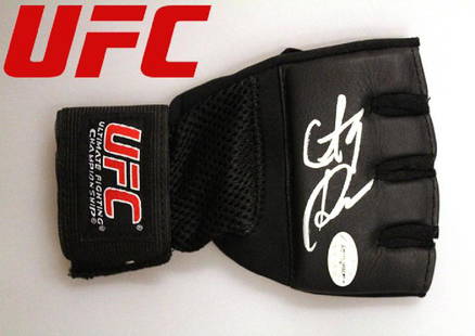 "UFC" - CM Punk signed Logo MMA glove: 100% In-Person! "UFC" star and former 2x "WWE" champ 'CM Punk' (Phil Brooks) signed logo MMA glove (logo in image is for display purposes only - yes evidently we really have to say that). 