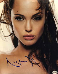 ANGELINA JOLIE - Stunning younger 11x14 close-up: 100% In-Person! Gorgeous younger 11x14 close-up portrait signed by Hollywood mega-star Angelina Jolie. Signed in person on 12/7/05 at the Waldorf-Astoria Hotel in NY. Dimensions: 11" x 14" Artist