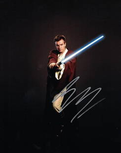 "STAR WARS: The Phantom Menace" Ewan McGregor Signed: Description: 100% In-Person. Great action pose with lightsaber! Signed color 8x10 photo as a young 'Obi-Wan Kenobi' from the new trilogy. Dimensions: 8" x 10" Artist or Maker: Ewan McGregor 