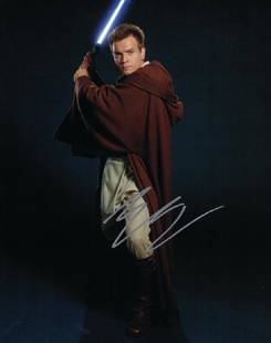 "STAR WARS: The Phantom Menace" Ewan McGregor Signed: Description: 100% In-Person. Another great signed pose, with lightsaber, as 'Obi-Wan Kenobi' by star Ewan McGregor. Dimensions: 8" x 10" Artist or Maker: Ewan McGregor Medium: Photograph 