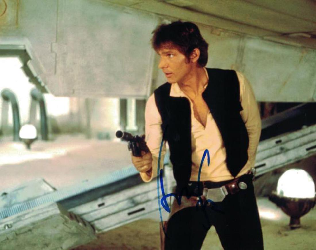 "STAR WARS: A New Hope" Harrison Ford Signed 8x10 Photo: Description: 100% In-Person. CLASSIC action scene with his Blaster as 'Han Solo' from "A New Hope". Dimensions: 8" x 10" Artist or Maker: Harrison Ford Medium: Photograph Condition Report: Very Good P