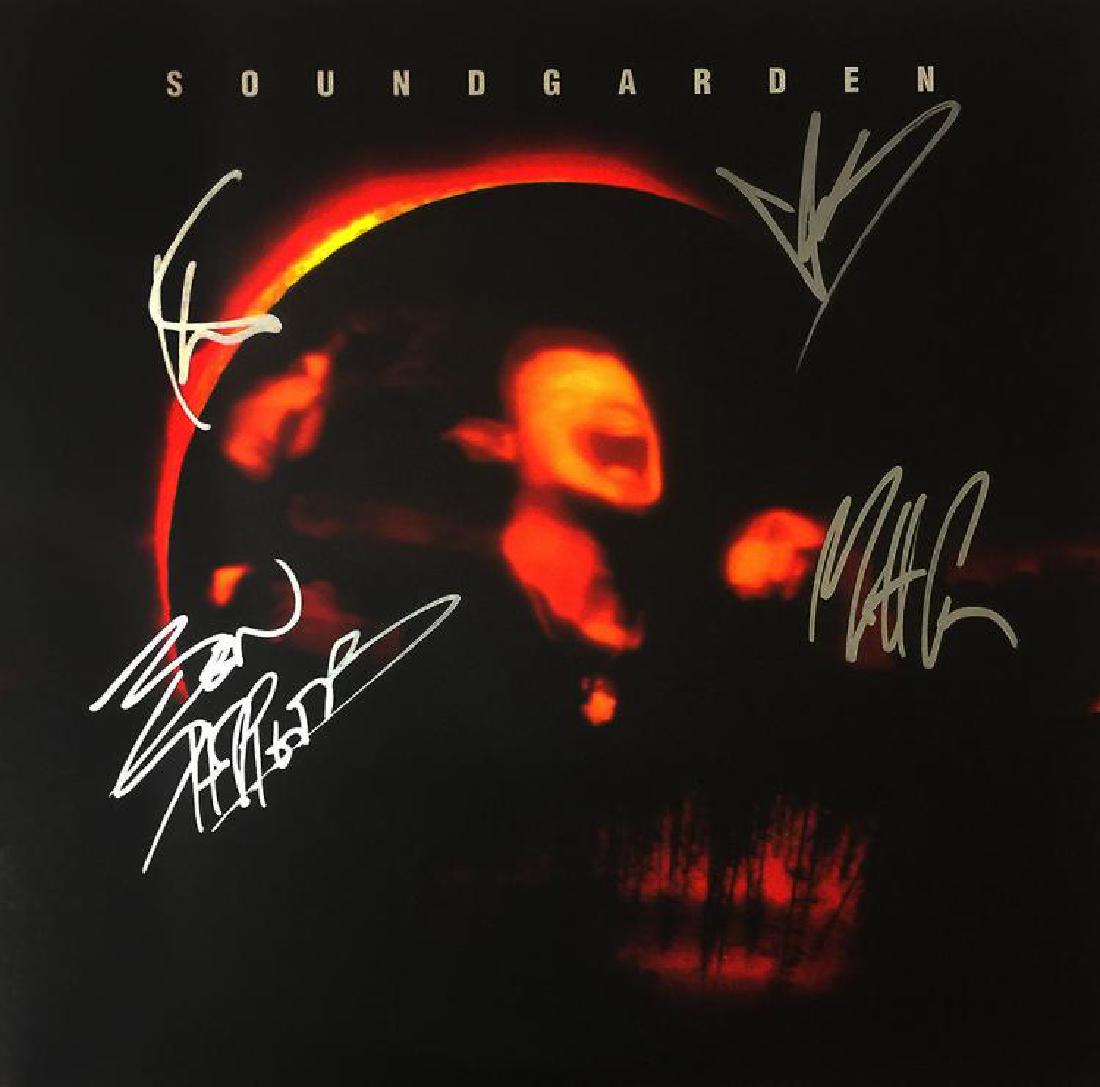 "SOUNDGARDEN" Orig. Band, with Cornell, signed (1 of 2)