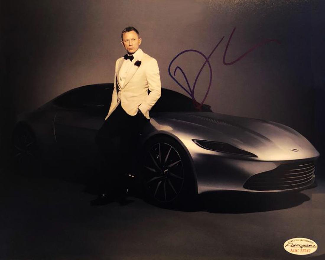 "JAMES BOND" - Daniel Craig w/Astin Martin signed 8x10 (1 of 2)