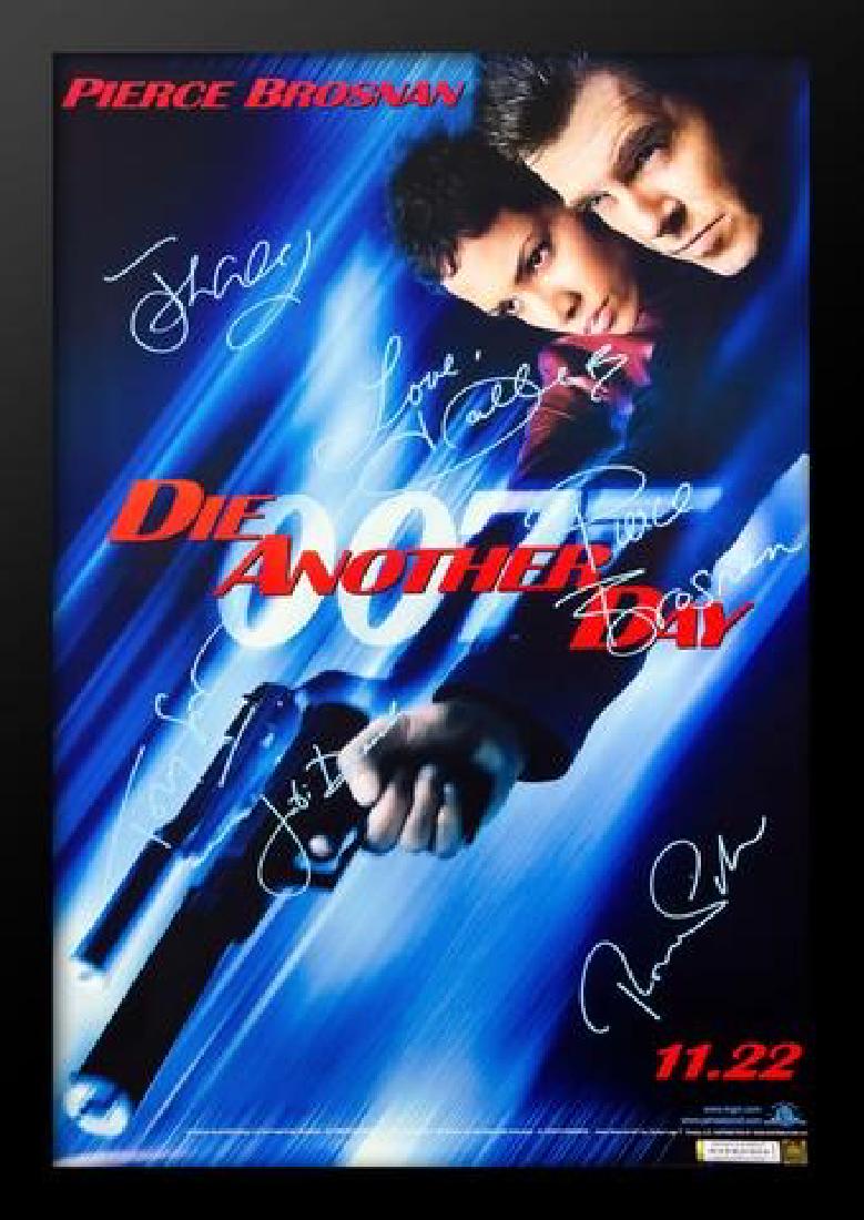 James Bond: Die Another Day - Signed Movie Poster: Signed by Pierce Brosnan, Halle Berry, Toby Stephens, Rosamund Pike, Rick Yune, Judi Dench, John Cleese, Michael Madsen and Will Yun Lee High gloss stock paper in wood framing with UV protective acryl