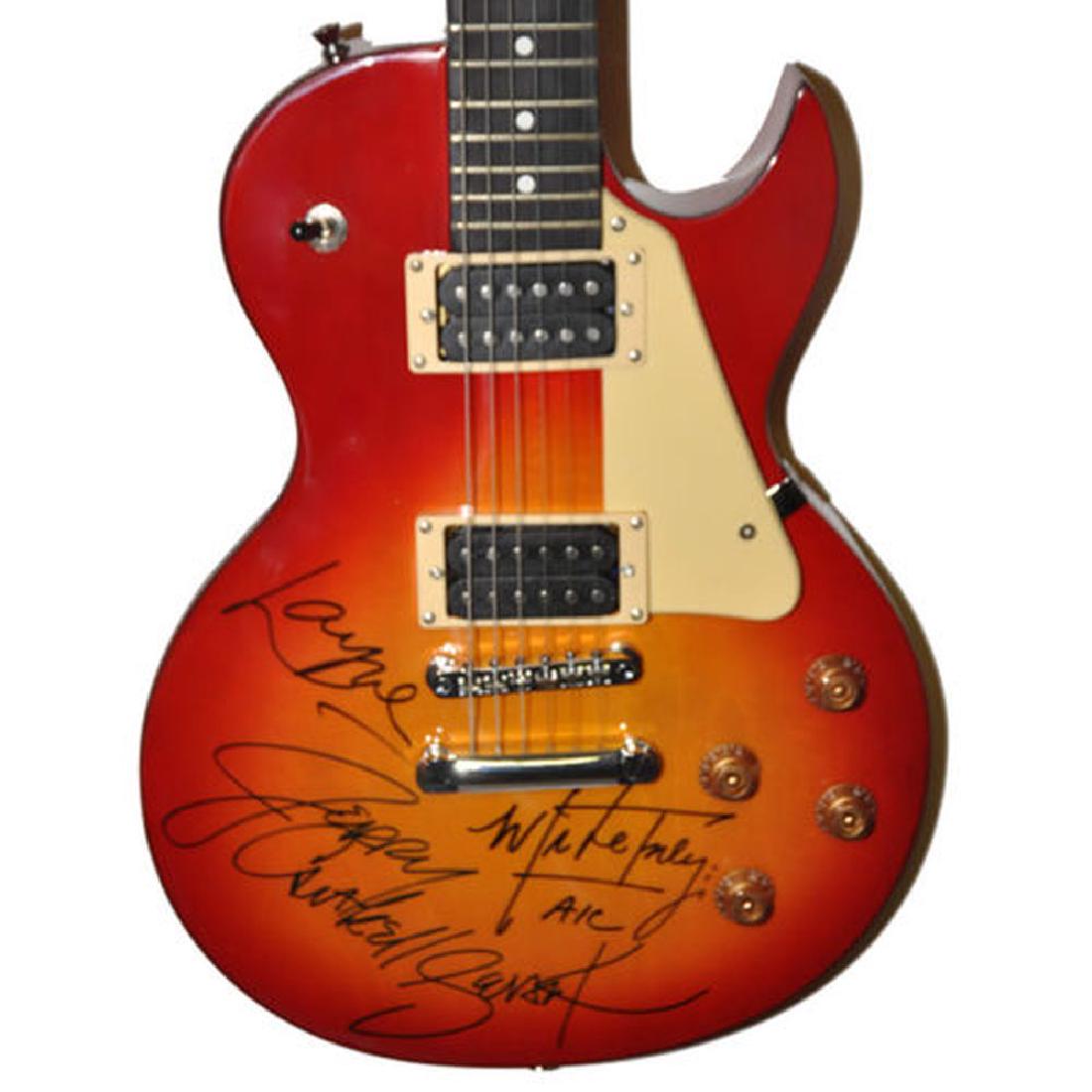 Alice In Chains Signed Guitar: Signed by Layne Staley, Jerry Cantrell, Sean Kinney, and Mike Inez