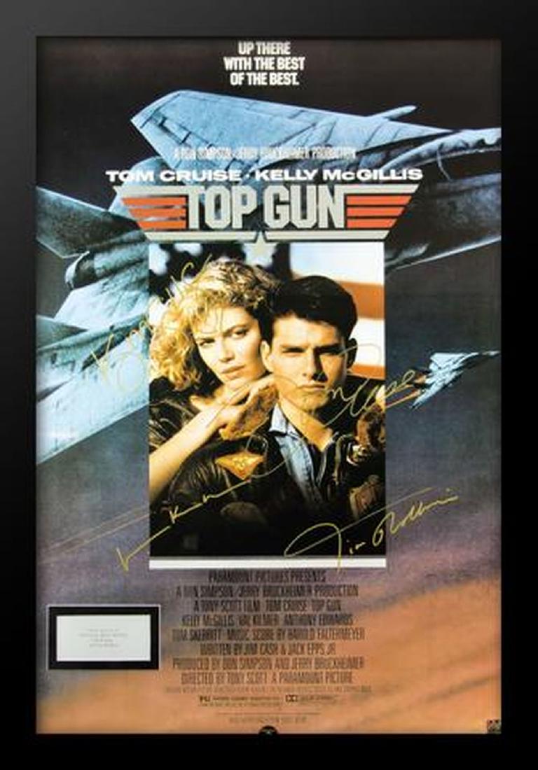 Top Gun - Signed Movie Poster: Signed by Tom Cruise, Kelly McGillis, Val Kilmer, Anthony Edwards, Tom Skerritt, Tim Robbins and Meg Ryan High gloss stock paper in wood framing with UV protective acrylic glass All collectibles with 