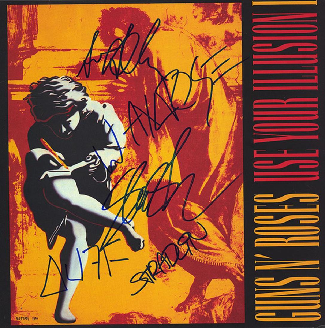 Guns N Roses "Use Your Illusion I": Album signed by W. Axl Rose, Slash, Duff McKagan, Steven Adler, and Izzy Stradlin