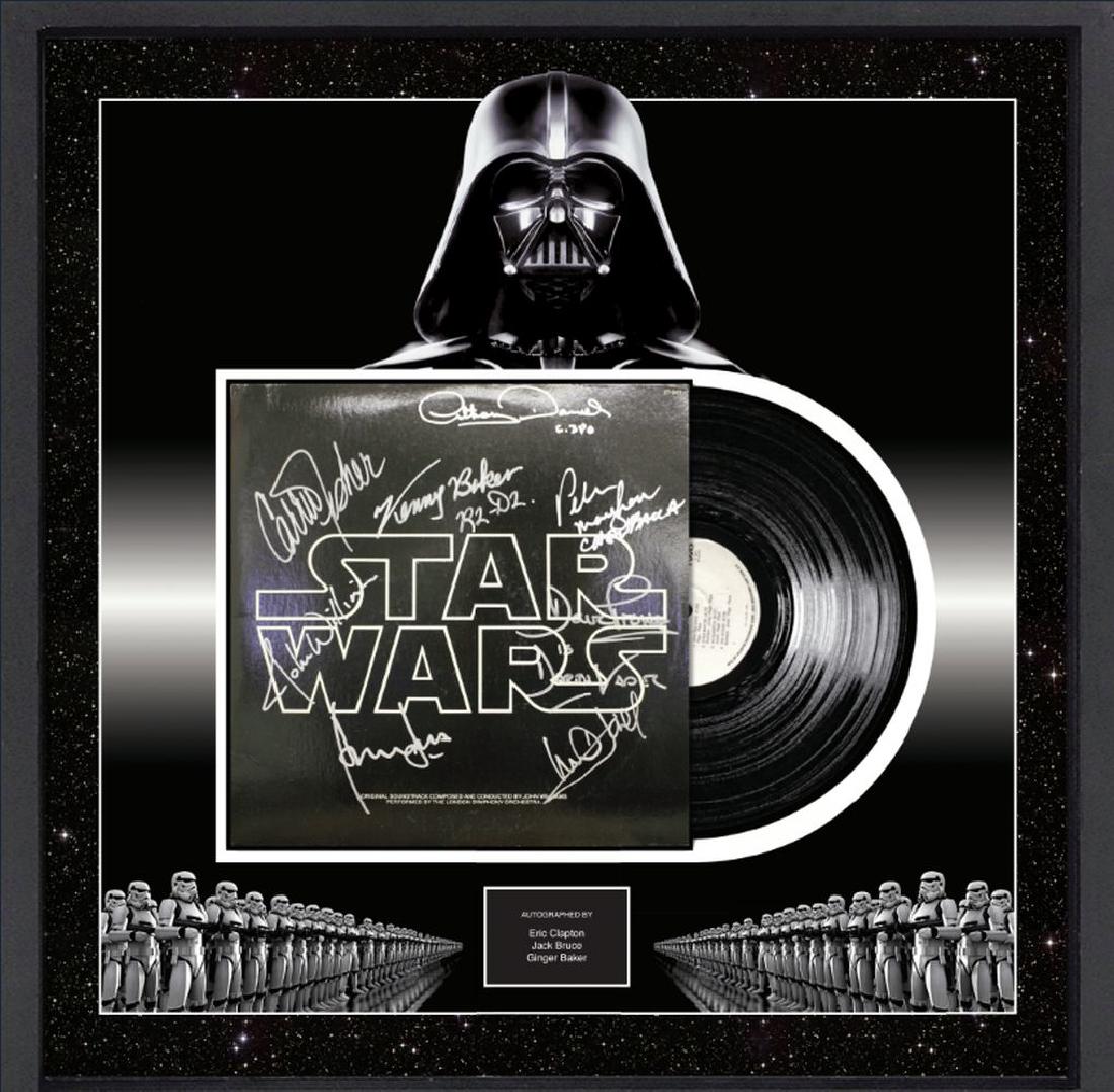 Star Wars Soundtrack Signed by Cast: Signed by Kenny Baker, Anthony Daniels, Carrie Fisher, John Williams, Harrison Ford, David Prowse, Mark Hamill, and Peter Mayhew