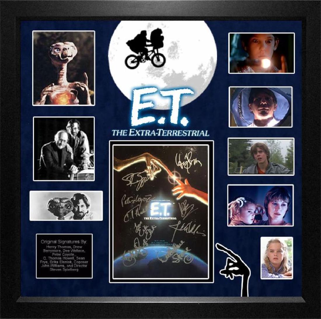 E.T. Signed Mini Poster Collage: Signed by Henry Thomas, Drew Barrymore, Dee Wallace, Peter Coyote, C. Thomas Howell, Sean Frye, Erika Eleniak, Composer John Williams, and Director Steven Spielberg